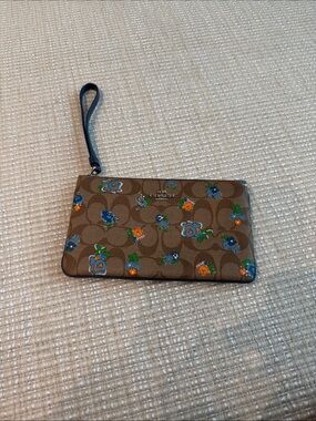 Coach Brown Floral Logo Wristlet with Blue & Orange Flowers